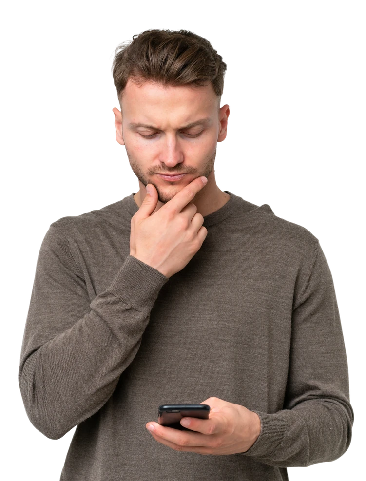 Thoughtful man reading his phone