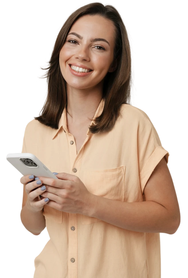 Smiling woman in a peach shirt holding her phone