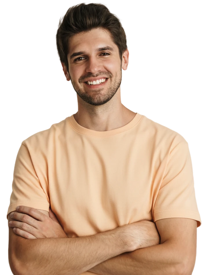 Smiling man in a peach t-shirt with his arms crossed